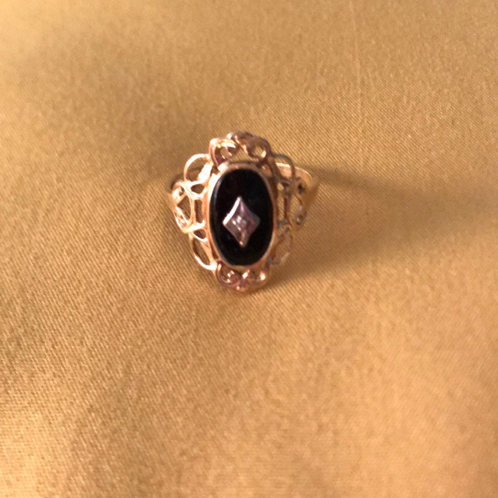 Size 9 10k Gold and Onyx ring.
